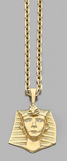 null Necklace in yellow gold 750 thousandths supporting in pendant a head of pharaoh...