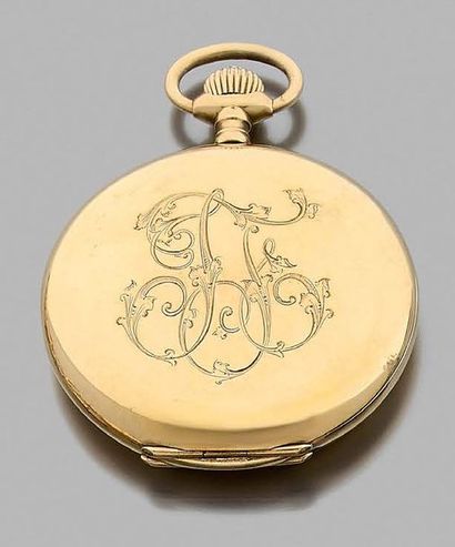 null Soap-shaped pocket watch in 750-thousandths yellow gold, monogrammed with pendant...