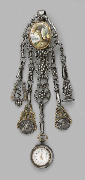 Metal chain decorated with a miniature on...