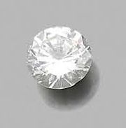 null Diamond on paper of brilliant cut and round shape.
Accompanied by a C.G.L. diamond...