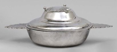 null Bowl covered in plain silver, the ears decorated with shells, the lid with a...