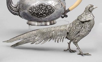 null Pair of silver metal pheasants.
Height: 13.5 and 14 cm
Length: approx. 30 c...