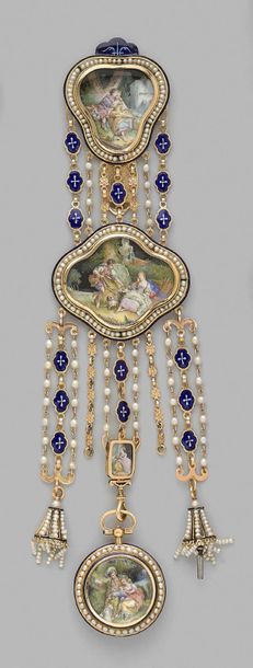 null A yellow gold chain decorated with two poly-lobed motifs, each set with a miniature...