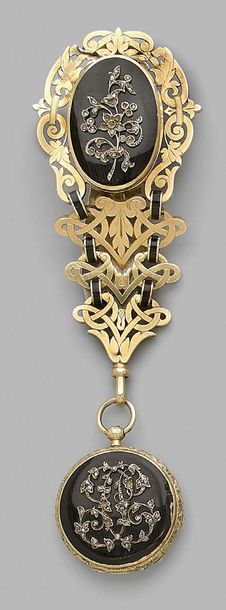 null Yellow gold castelaine, decorated with interlacing and applied flowers on a...
