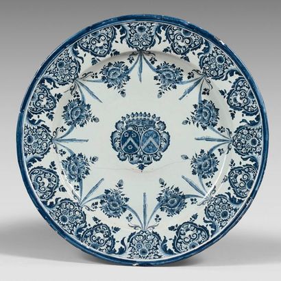 ROUEN Very large dish decorated in blue monochrome with a double central coat of...