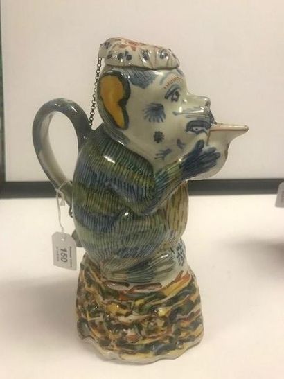 DELFT Covered jug in the shape of a monkey sitting on a base with a base of abstract...