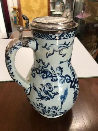 DELFT Covered jug decorated in blue monochrome with an inscription in Dutch that...