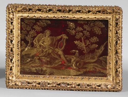 Panel in gilded eglomised glass on a red...
