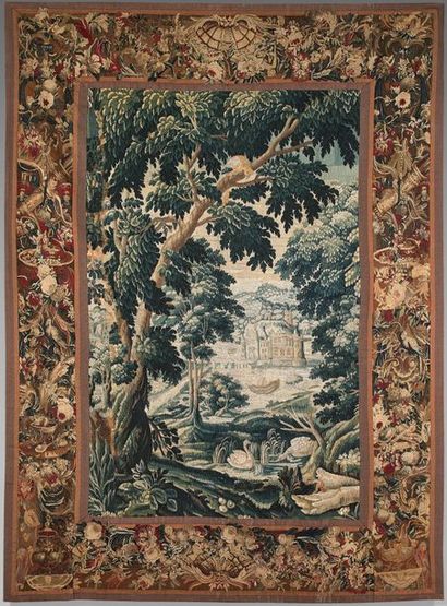 Tapestry decorated with a castle surrounded...