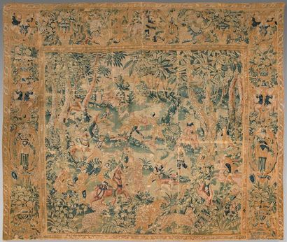 Tapestry decorated with a hunting scene in...