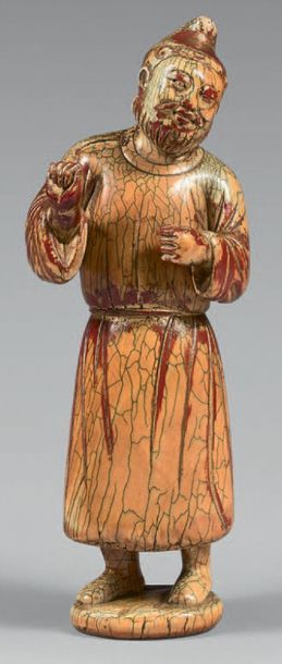 CHINE - Fin Époque MING (1368-1644), XVIIe siècle 
Statuette en ivoire à patine jaune...