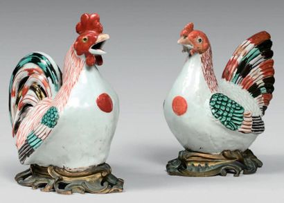 JAPON, Fours d'Arita - Fin du XVIIe siècle 
Couple de coq et de poule en porcelaine...
