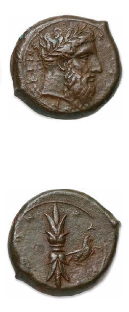 null SICILE
Syracuse (344-317 av. J.-C.)
Hemilitron de bronze. 12,37 g.
Tête laurée...