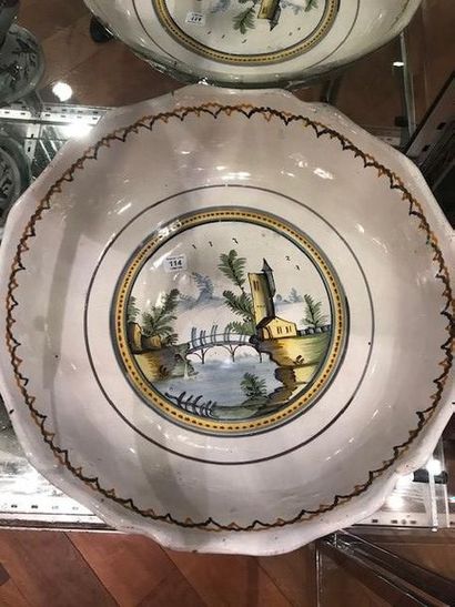 Nivernais Round salad bowl with gadrooned rim, polychrome decoration of a landscape...