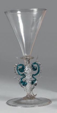 null Conical cut glass on a hollow baluster base decorated with twisted flutes framed...