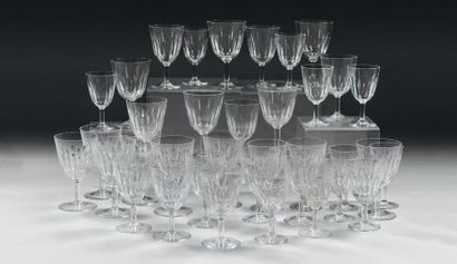 null About thirty-six Baccarat crystal stemmed glasses in three sizes.
And five of...