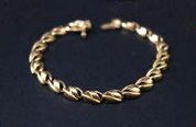 -Bracelet articulé en or jaune (750 millièmes),...