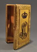 null -Yellow gold case (750 thousandths), the hinged lid monogrammed "L.C.O" surmounted...