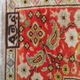 HEREKE Fine silk carpet decorated with boteh lines on an almond background. Floral...