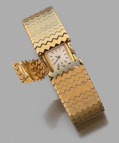 GUBELIN 
Ladies wristwatch in 18k gold 750 thousandths. Case with secret clasp in...