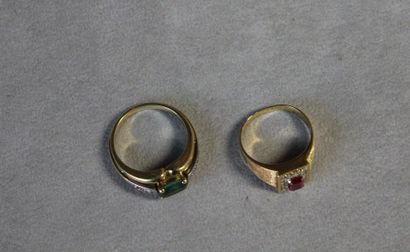 null Ring in 585 thousandths yellow gold set with a tourmaline between four round...