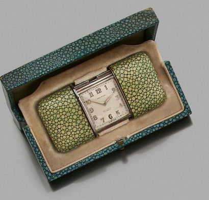 Movado, Ermeto. 
Silver travel watch in shagreen. Case with sliding closure serving...