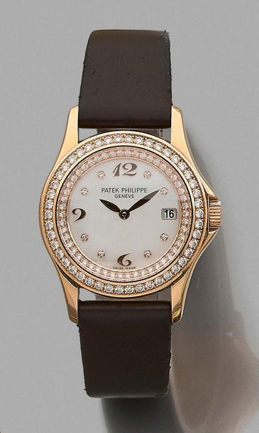 PATEK PHILIPPE 
Ladies' wristwatch in 750 thousandths yellow gold and diamonds. Bezel...