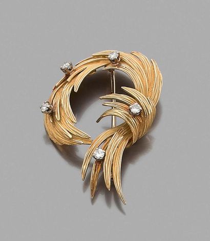 Brooch in 750 thousandths yellow gold with...