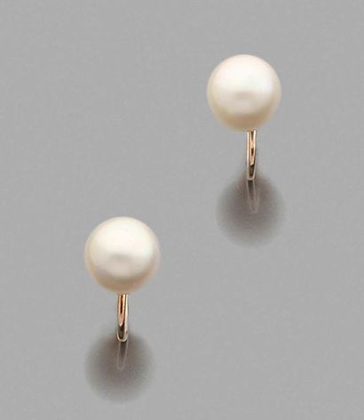 Set comprising: a pair of earrings in platinum...
