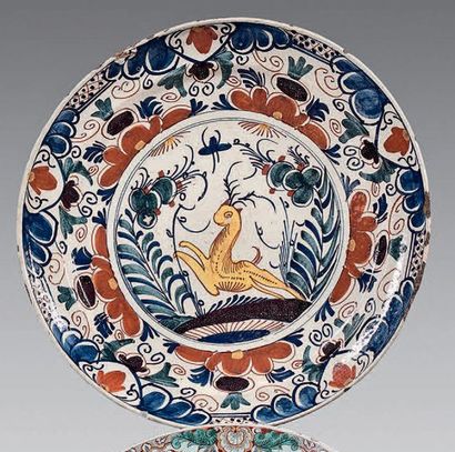 DELFT Dish with stylized polychrome decoration of a deer in a vegetal landscape in...
