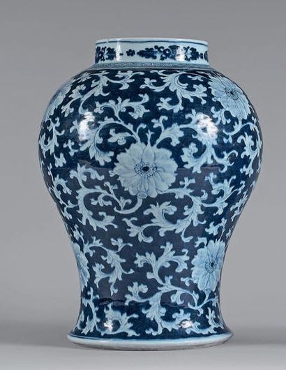 null Chinese porcelain baluster vase decorated with white flowers and foliage on...