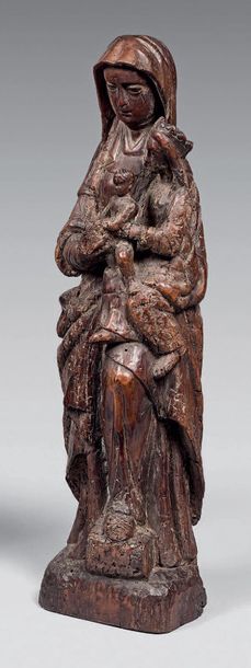 null Petite statue en noyer, autrefois polychrome, sculpté d'une sainte Anne trinitaire,...