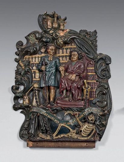 null Polychrome walnut panel carved in high relief of an apothecary doctor in his...