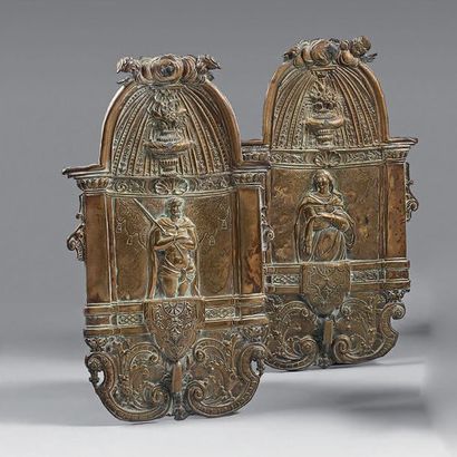 null Two repoussé brass applique plates, one of a Virgin and the other of a Christ...