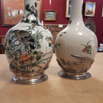 CHINE Pair of vases with neck, polychrome decoration of birds in flowered branches....