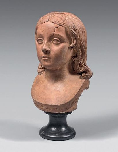 null Bust of a young girl in terracotta, titled "Virginie Constance Lemercier".
Turned...