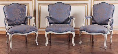 null Three armchairs with flat backrest in moulded beech wood with white lacquer....