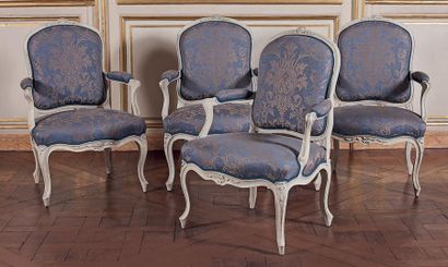 Four armchairs with flat curved backs in...