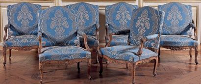 A suite of six flat-backed armchairs with...
