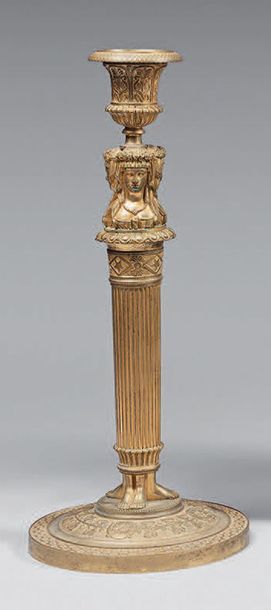 Pair of large gilt bronze torches, decorated...