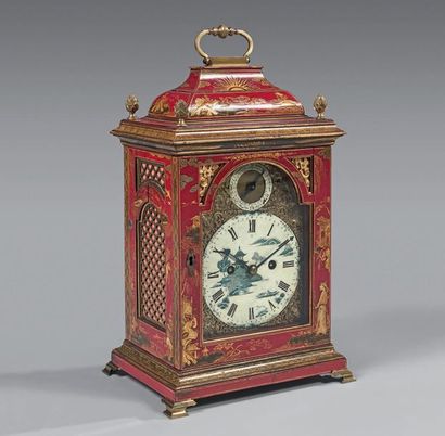 null Religious" clock in red lacquered wood and gold and ormolu with Chinese decoration....