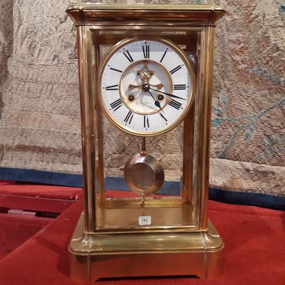 null Brass cage clock with bevelled windows.
Ring dial signed Louis Maurin in Paris....