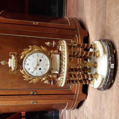 null Large white marble portico clock with six red marble columns. Base in red Levanto...