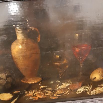 École Flamande du XVIIe siècle 
Still life, pitchers, glasses, shellfish and fruits
Oil...