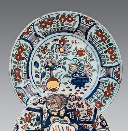 DELFT Dish with polychrome decoration of vases with flowers and insects in the centre...