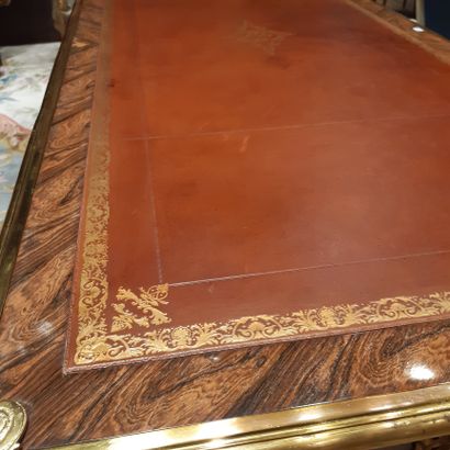 null Flat rosewood veneer desk with three drawers, two of which are lightly boxed....
