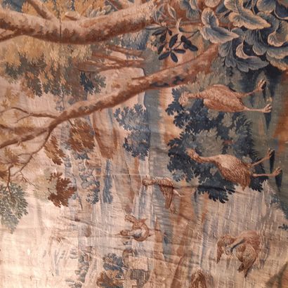 null Wool and silk tapestry decorated with numerous birds, including a wader catching...