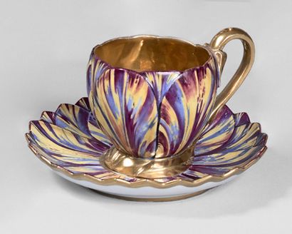 PARIS, Dagoty 
Cup and its saucer with polychrome and gold decoration of flower petals...