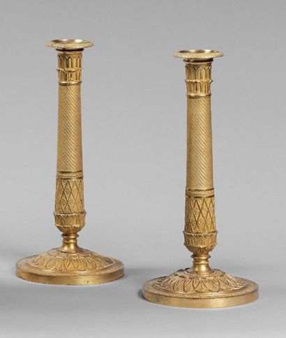 null Pair of gilt bronze torches decorated with guilloches, crosses and palmettes.
Early...