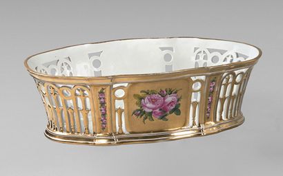 PARIS Large openwork oval basket with polychrome decoration of roses standing out...
